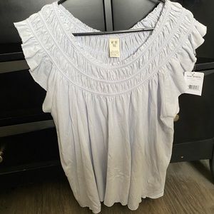 **SOLD** we the free coconut gathered top